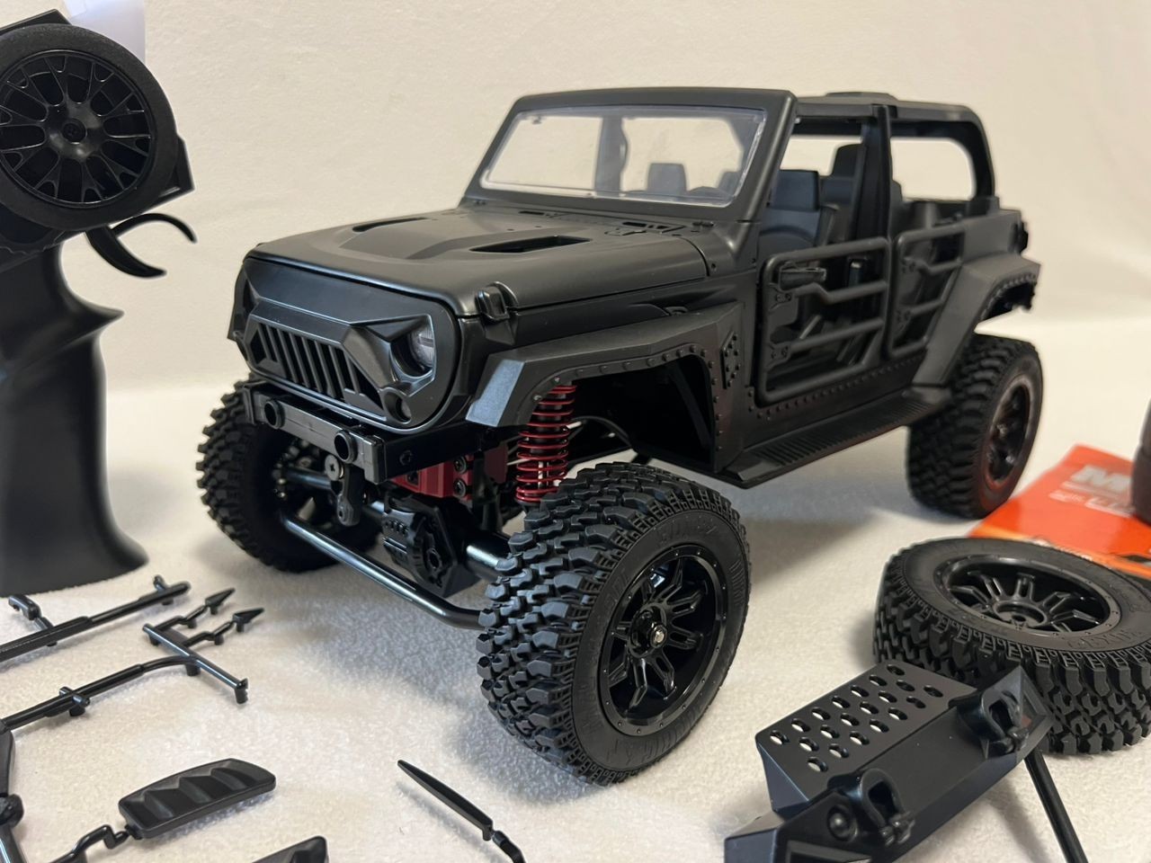 Jeep Wrangler MN128 RC Car Crawler escala 1:12 2.4G 4x4 camión todoterreno 2 baterías-