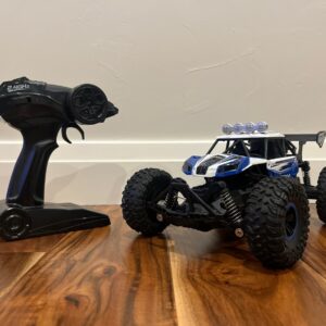Coche de radiocontrol todoterreno Topracing con 2 baterías recargables-