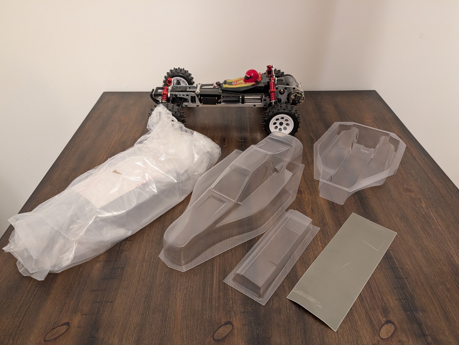 Buggy Kyosho Optima KYO30617B escala 1/10 4x4 con 2 carrocerías y soportes Optima Pro-