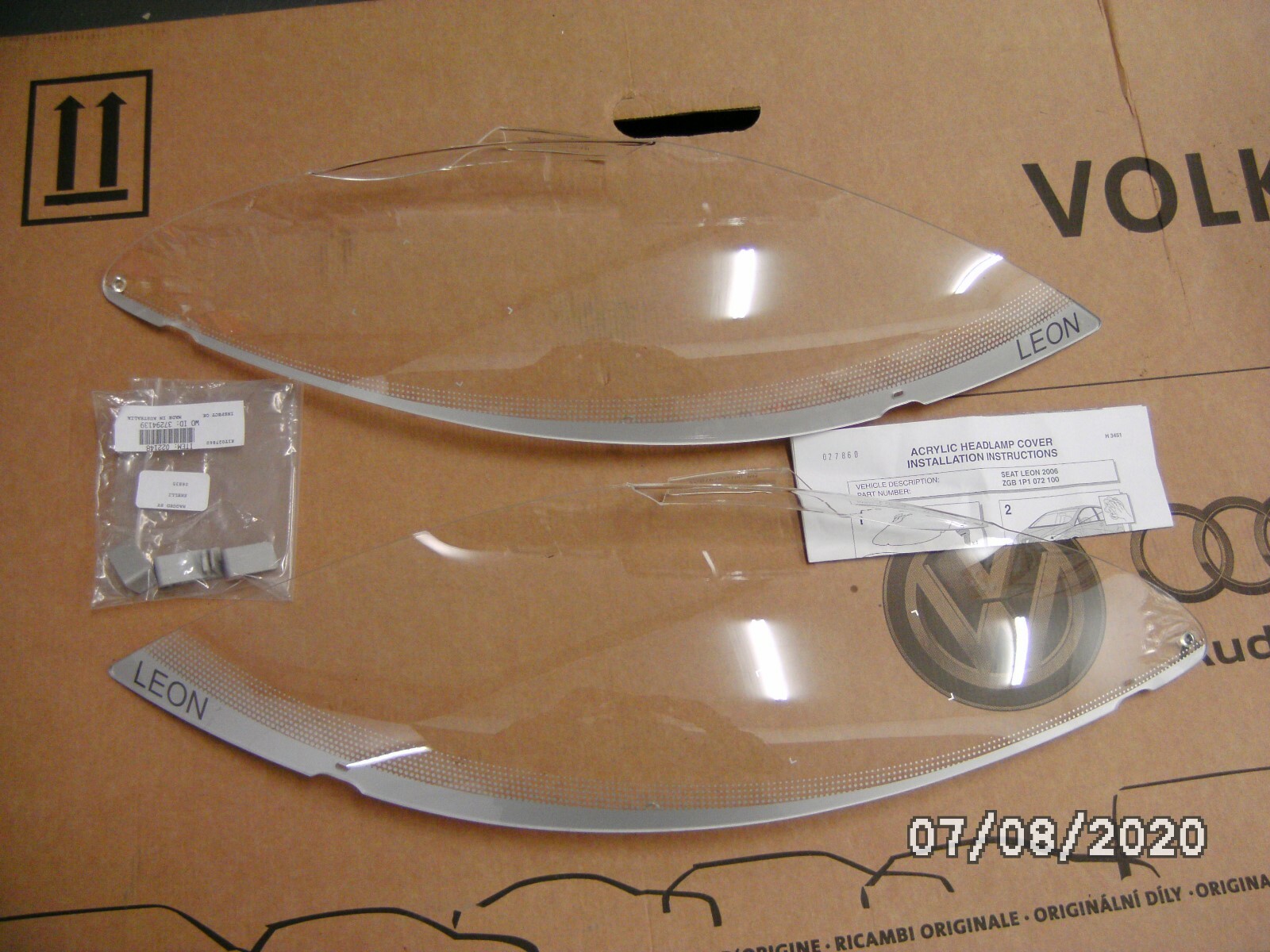 NUEVO ORIGINAL SEAT LEON 2006 - 2009 KIT PROTECTOR DE FAROS ZGB1P1072100-