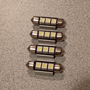 ¡Juego de 4! 6411 Bombillas LED Automotrices 12V Interior Cortesía, Baúl, Licencia-