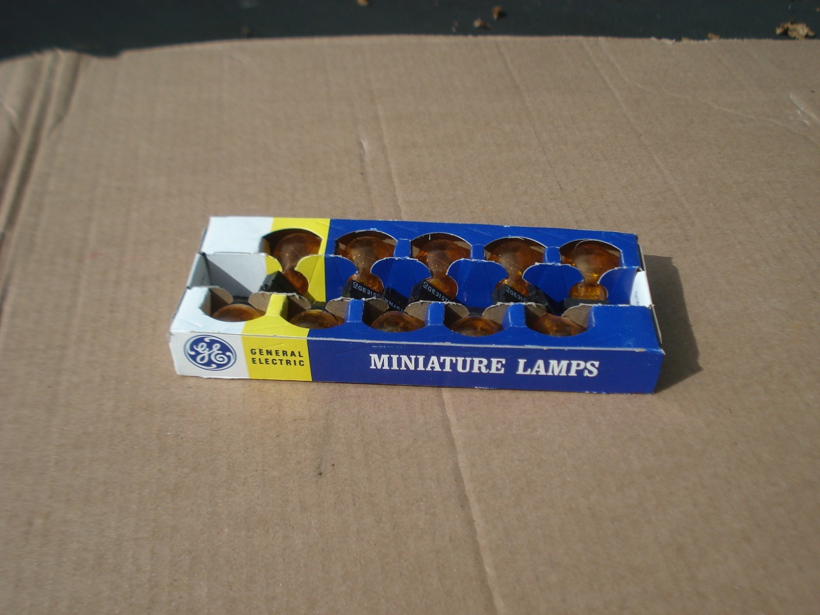 Box of Ten GE 3157NA Automotive Turn Signal marker Lamps NEW Amber Glass