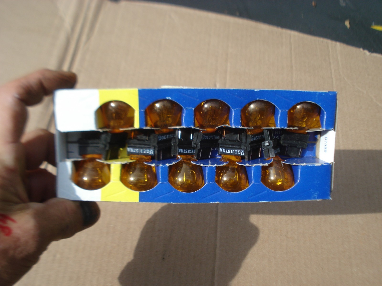 Box of Ten GE 3157NA Automotive Turn Signal marker Lamps NEW Amber Glass - Image 2
